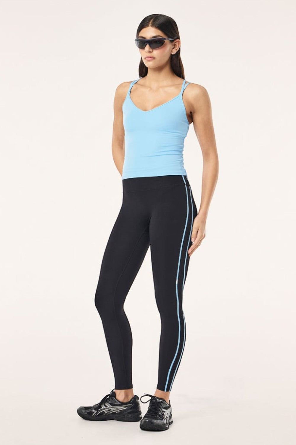 Model wearing ELSHAM BOUTIQUE Alaskan Blue Paramount Tank with scoop neck, double straps, and inbuilt bra.