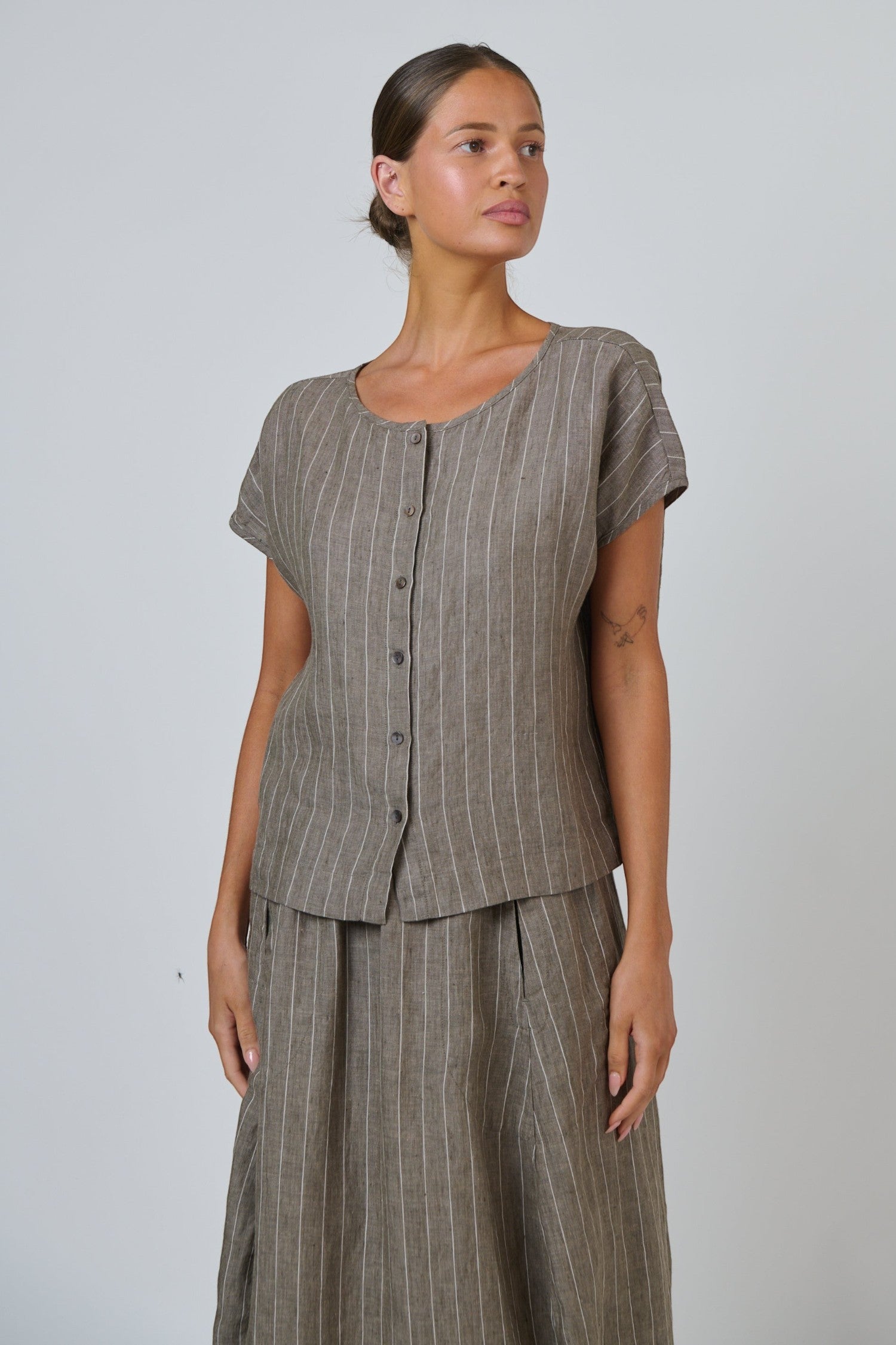 ELSHAM BOUTIQUE GA504 linen button down top in taupe with white vertical stripes, round neckline, and short sleeves.