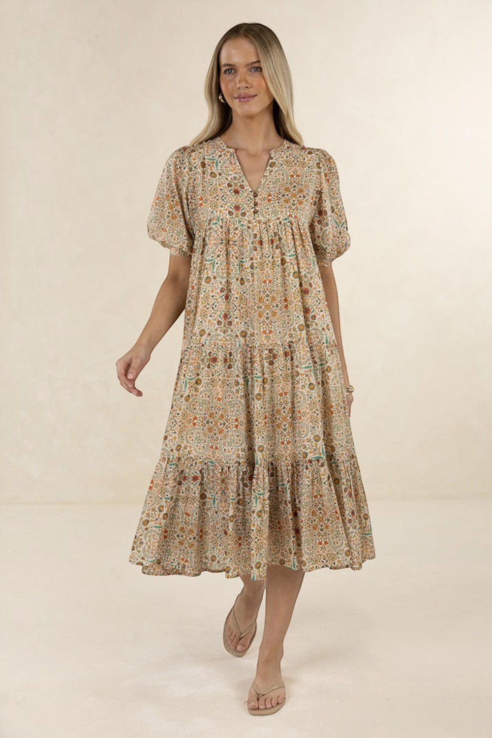 ELSHAM BOUTIQUE Yasmin midi dress in almond floral print with tiered frills, V-neckline, and short elasticated sleeves.