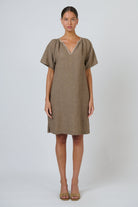 ELSHAM BOUTIQUE GA703 agate linen shift dress with V-neckline, contrast embroidery, and short sleeves on a model.