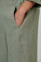 ELSHAM BOUTIQUE GA398 wide-leg linen trousers in artichoke green with a functional side pocket