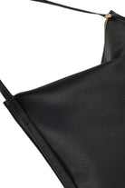 ELSHAM BOUTIQUE Chopalopagus black calf nappa leather slouchy shoulder bag with brass hardware and zip closure