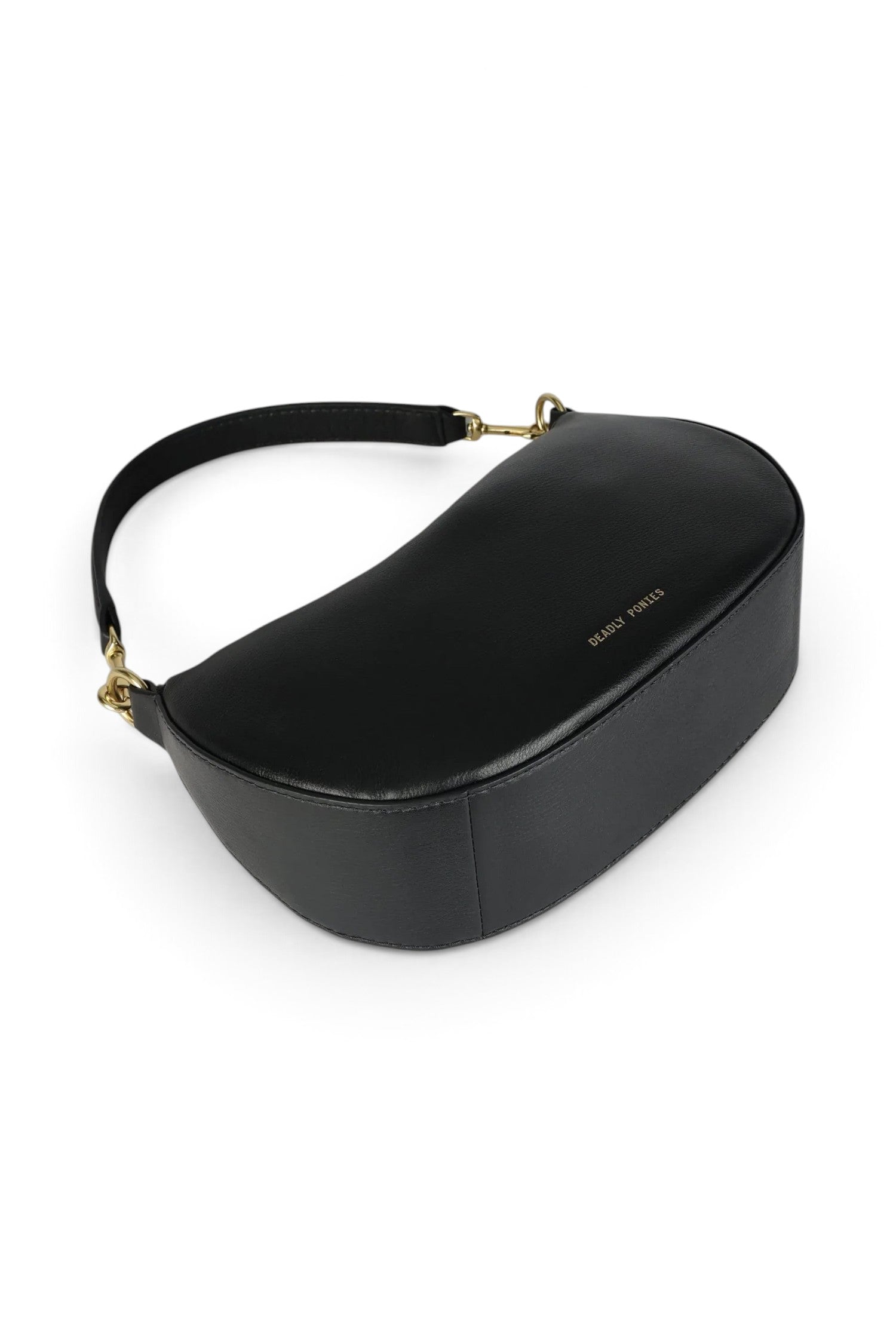ELSHAM BOUTIQUE black calf nappa mini sling bag with brass hardware and detachable handle on a white background