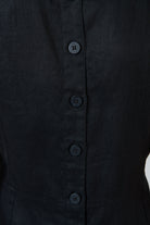 Close-up of the black linen fabric and tonal button placket on the back of an ELSHAM BOUTIQUE GA735 midi dress.
