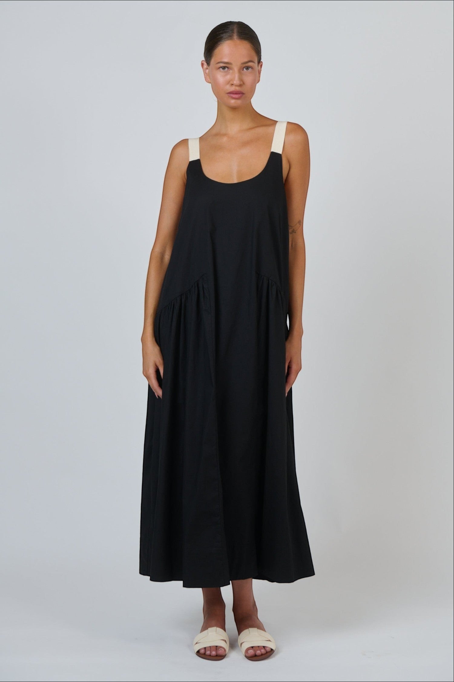 ELSHAM BOUTIQUE black poplin maxi dress with contrast buckle straps, scoop neckline, and tiered A-line skirt
