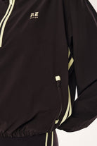 ELSHAM BOUTIQUE black Echo quarter zip jacket with lime green contrast binding and zipped side pockets