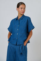 ELSHAM BOUTIQUE GA723 boxy chambray linen shirt with short cuffed sleeves, classic collar, and dual patch pockets.
