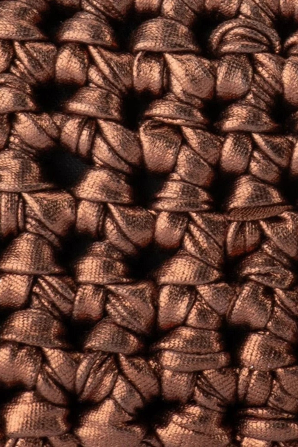 Close-up of the metallic bronze hand-crocheted texture of the ELSHAM BOUTIQUE Taylor clutch bag.