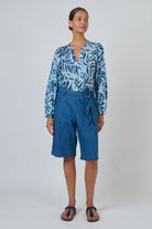 ELSHAM BOUTIQUE GA741 high-waisted chambray denim Bermuda shorts with a self-tie belt and wide-leg fit.