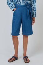 ELSHAM BOUTIQUE GA741 chambray denim bermuda shorts with a high waist, self-tie belt, and wide-leg fit.