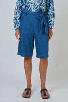 ELSHAM BOUTIQUE high-waisted chambray denim Bermuda shorts with a self-tie belt and wide-leg fit.