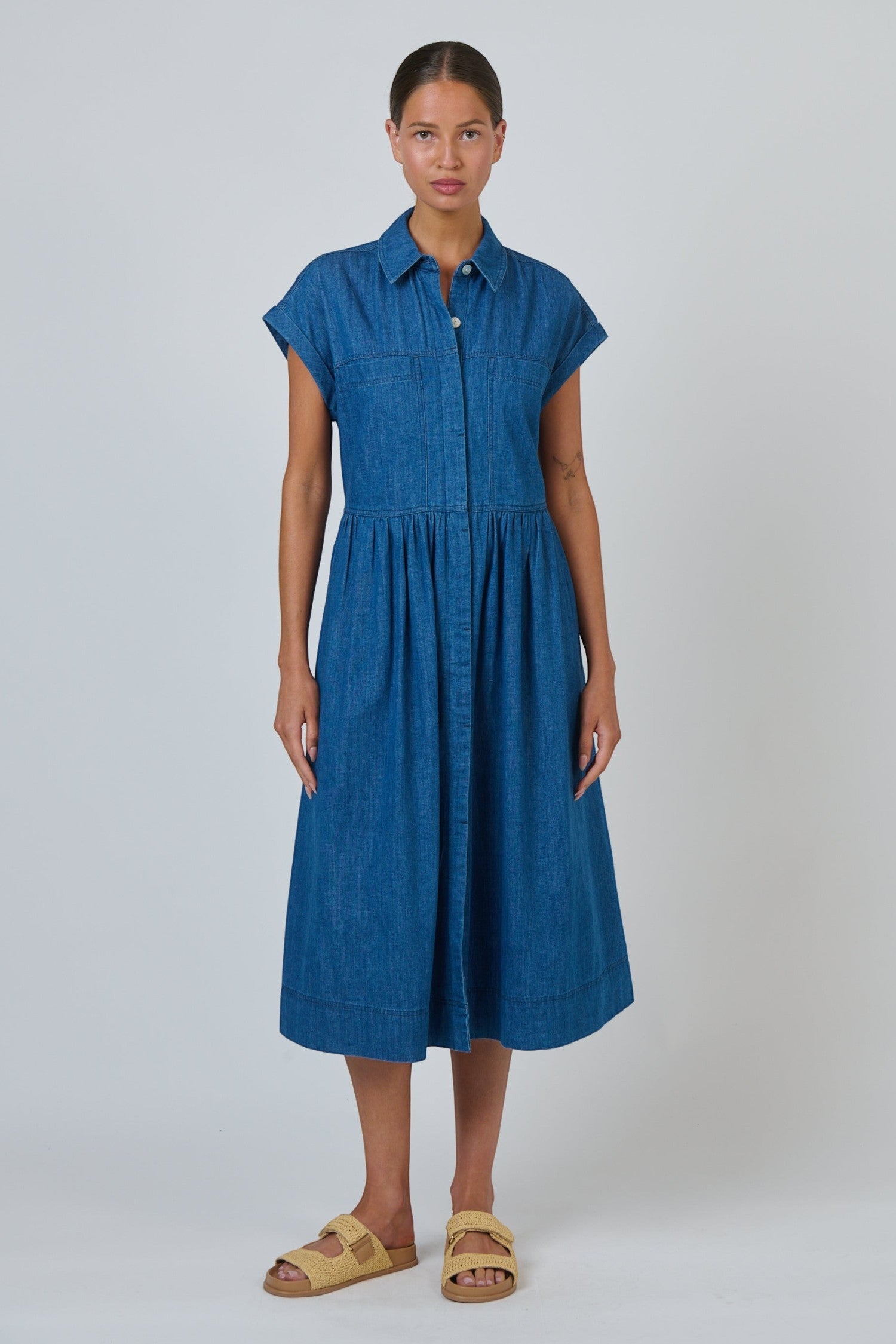 ELSHAM BOUTIQUE chambray shirt dress with cap sleeves, gathered waist, and midi skirt on a model