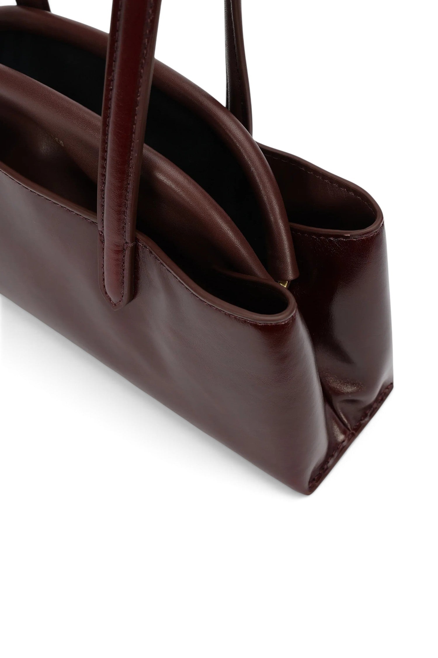 ELSHAM BOUTIQUE Mini Vault Tote in dark cherry glossy calf leather with fixed top handles and internal metal frame.