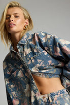 ELSHAM BOUTIQUE oversized Daria denim shacket in Cobaine Blue with vibrant all-over floral print and silver hardware.
