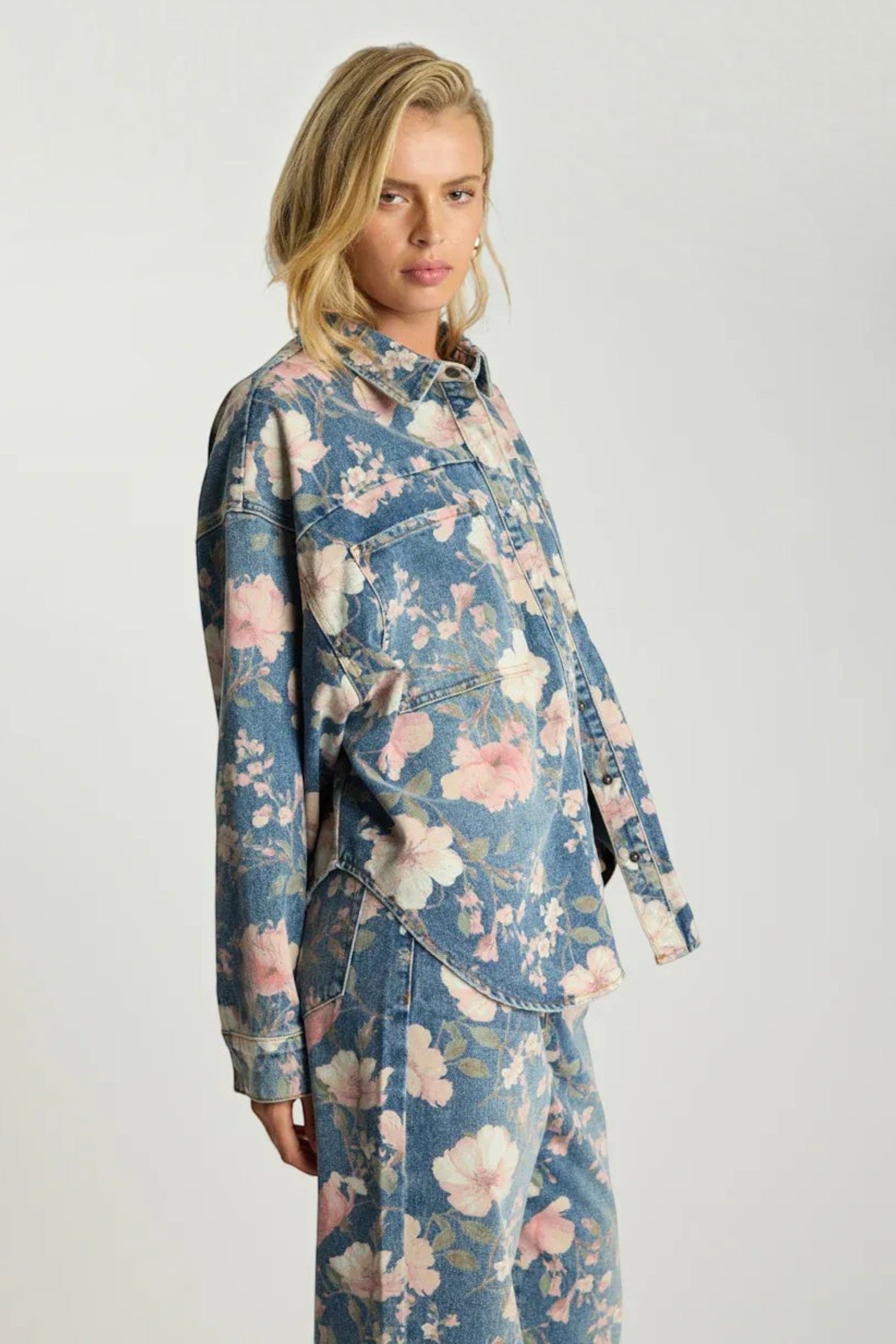 ELSHAM BOUTIQUE oversized blue denim shacket with pink floral print, classic collar, and silver hardware