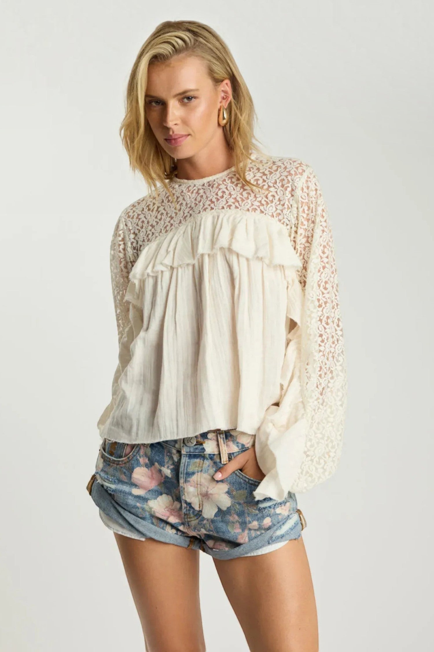 ELSHAM BOUTIQUE Bandits low waist denim shorts in floral bloom Cobaine blue with distressed hem and patch pockets
