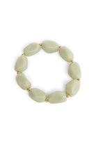 ELSHAM BOUTIQUE Havana stretch bracelet featuring pale green resin beads and small gold-tone metal accents.