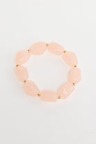 ELSHAM BOUTIQUE Havana stretch bracelet featuring blush pink resin beads and small gold-tone metal accents