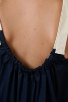 ELSHAM BOUTIQUE ink blue poplin maxi dress with a scoop back and contrasting cream adjustable buckle straps