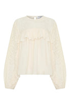 ELSHAM BOUTIQUE ivory cotton blouse with sheer lace yoke, cascading front frills, and long sleeves with lace panels.