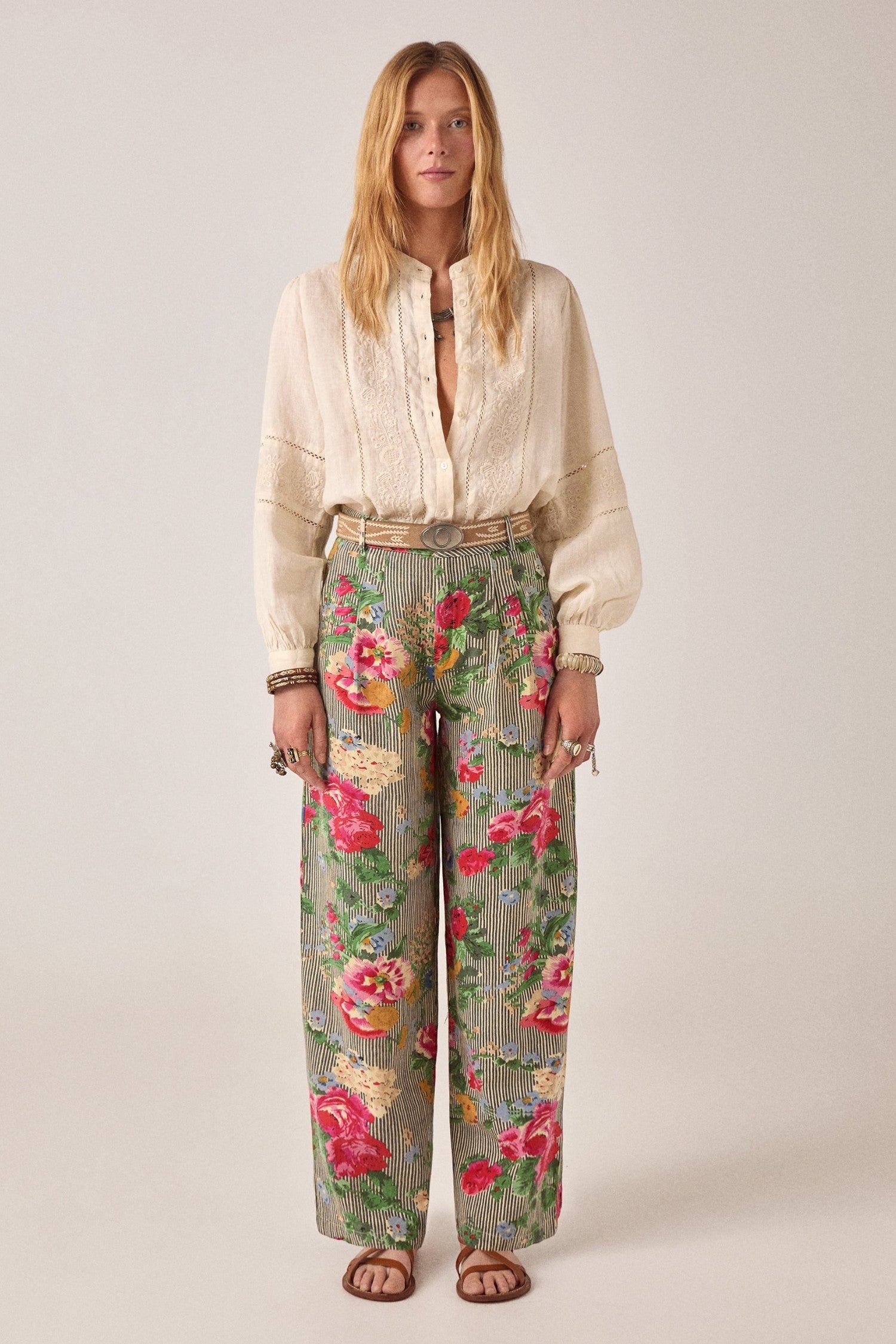 ELSHAM BOUTIQUE ivory cotton-linen blouse with delicate embroidery, long sleeves, and button-down front on a model.