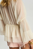 Back view of ELSHAM BOUTIQUE ivory sheer chiffon blouse with voluminous peasant sleeves and elasticated waist detail