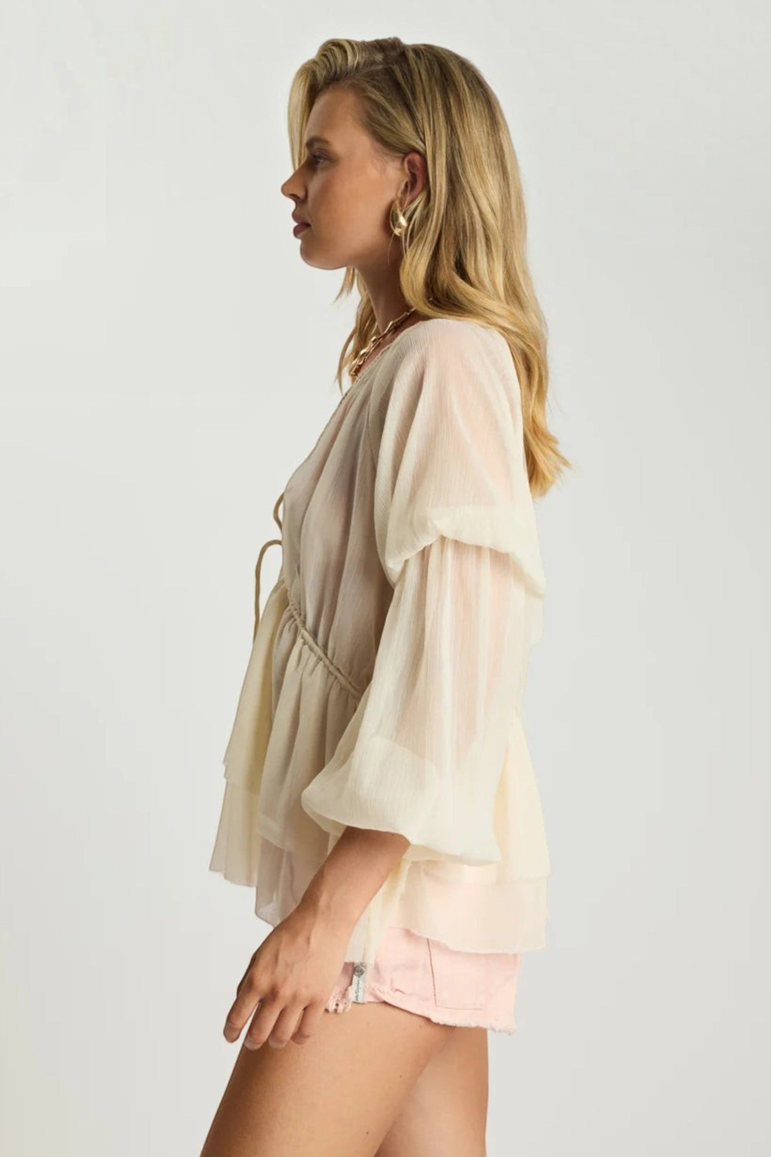 ELSHAM BOUTIQUE ivory sheer chiffon Luminette blouse with peasant sleeves, V-neck, and tie front, side view