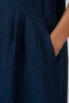 ELSHAM BOUTIQUE GA684 eclipse blue linen midi dress featuring a side pocket and inverted pleat detail