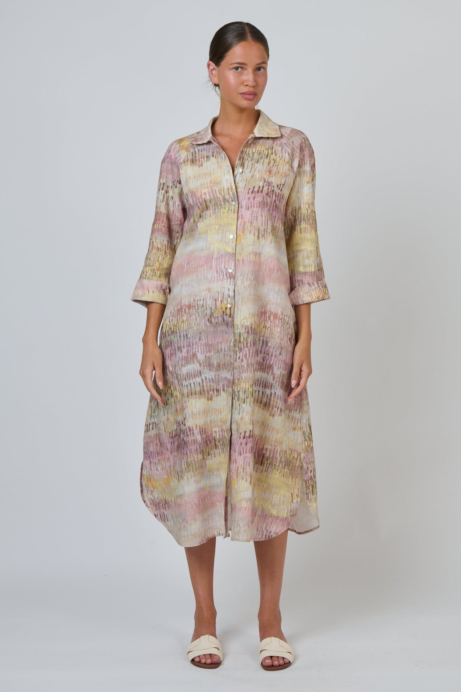 Model wearing ELSHAM BOUTIQUE GA417 midi shirt dress in multi-coloured linen with point collar and high-low hem