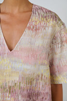 ELSHAM BOUTIQUE GA683 linen V-neck top in a multicoloured abstract print with wide elbow-length sleeves.