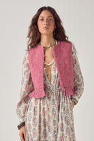 ELSHAM BOUTIQUE Mia quilted cotton vest in peonia punk pink worn over a floral maxi dress by a female model