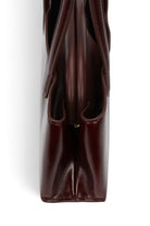 ELSHAM BOUTIQUE Mini Vault Tote in dark cherry glossy calf leather, side profile view showing internal metal frame.