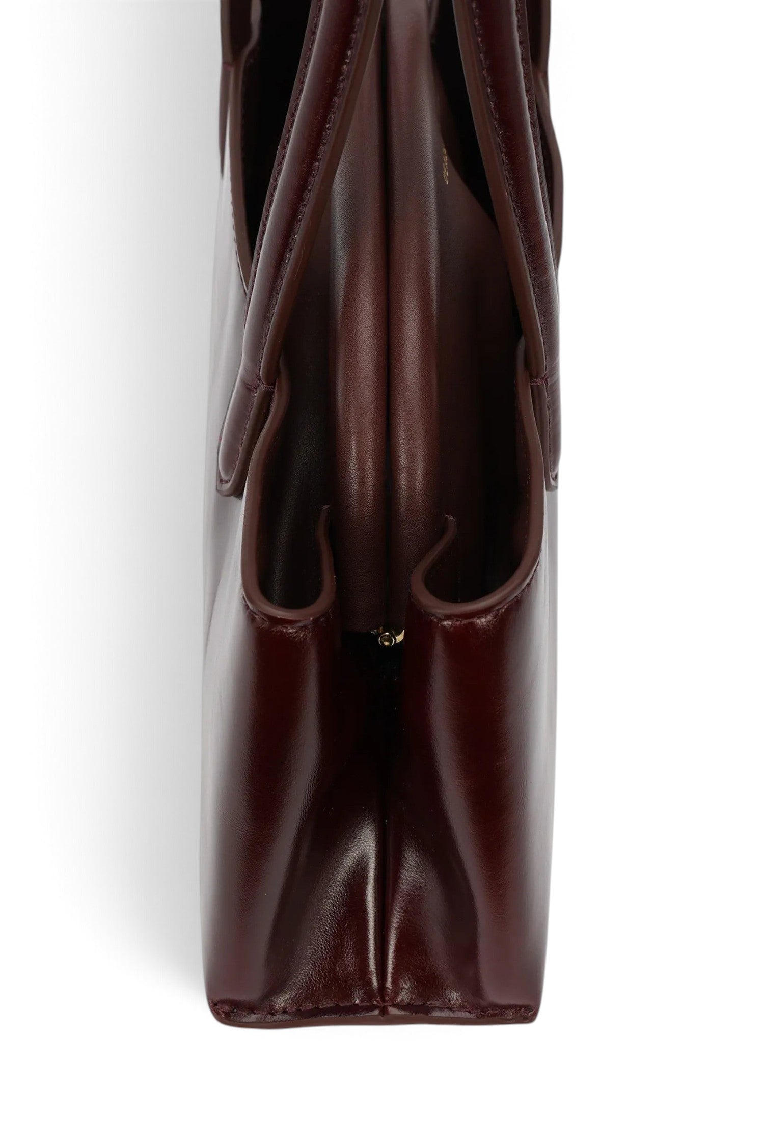 ELSHAM BOUTIQUE Mini Vault Tote in dark cherry glossy calf leather, side profile view showing internal metal frame.