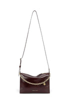 ELSHAM BOUTIQUE Minimese crossbody bag in dark cherry glossy calf nappa leather with a gold chain and adjustable strap.