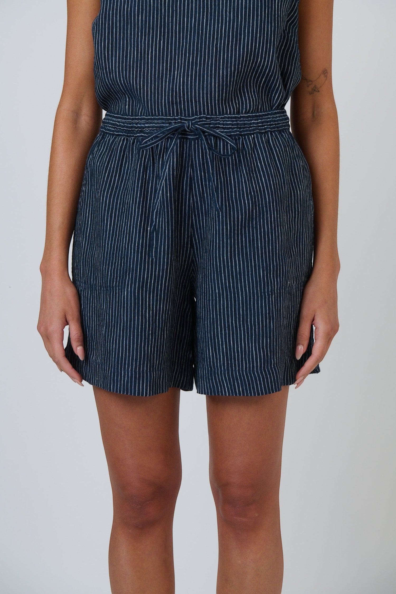 ELSHAM BOUTIQUE GA477 navy blue pinstripe linen shorts with a drawstring waistband and relaxed fit.
