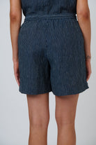 Back view of ELSHAM BOUTIQUE GA477 navy blue pinstripe linen shorts with a comfortable drawstring waistband.