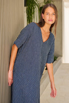 ELSHAM BOUTIQUE GA707 navy blue pinstripe linen midi dress with V-neck and elbow-length sleeves on a model