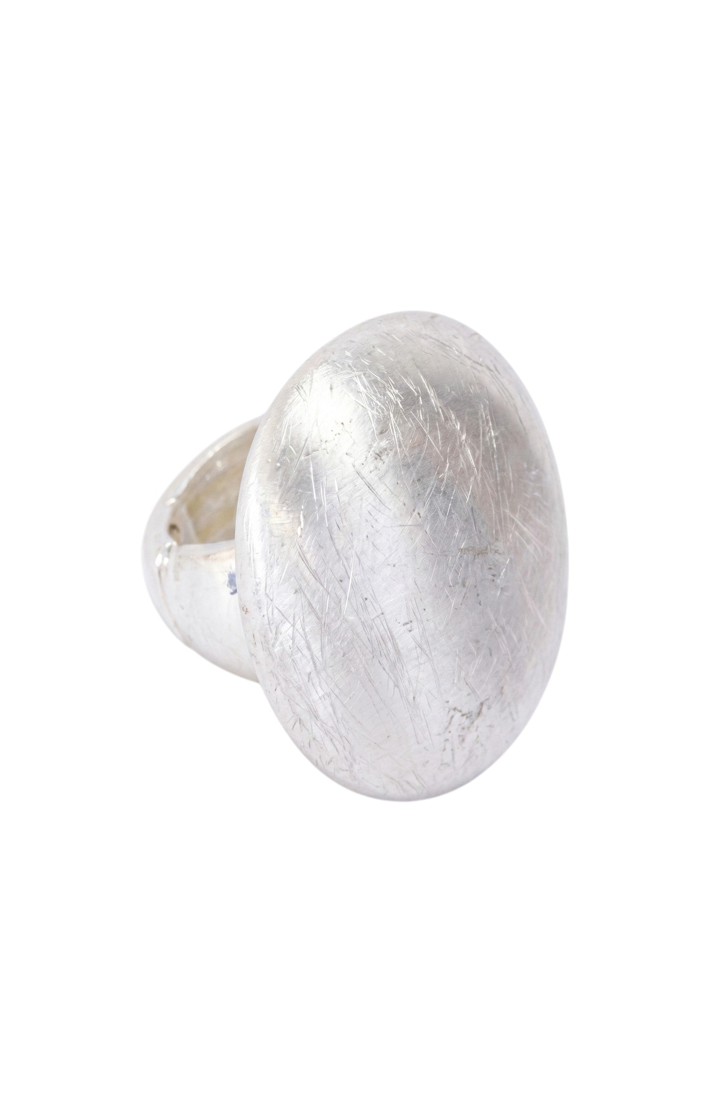 ELSHAM BOUTIQUE Nola ring in silver with a smooth domed face and brushed texture finish. Modern sculptural design.