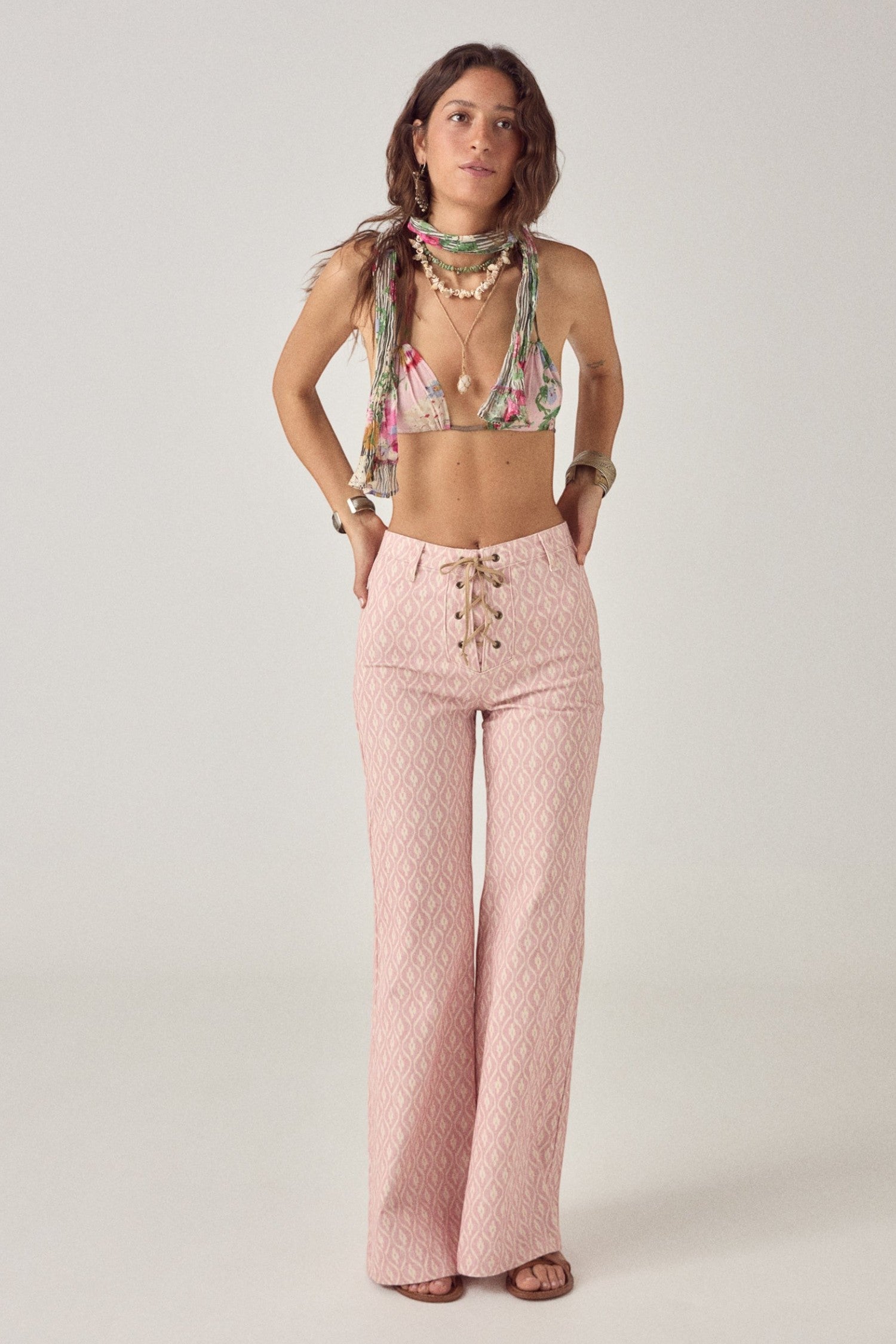 ELSHAM BOUTIQUE Nuca Scarf in Bolton Soul Rouge, a 100% cotton gauze floral scarf worn as a top by a model.