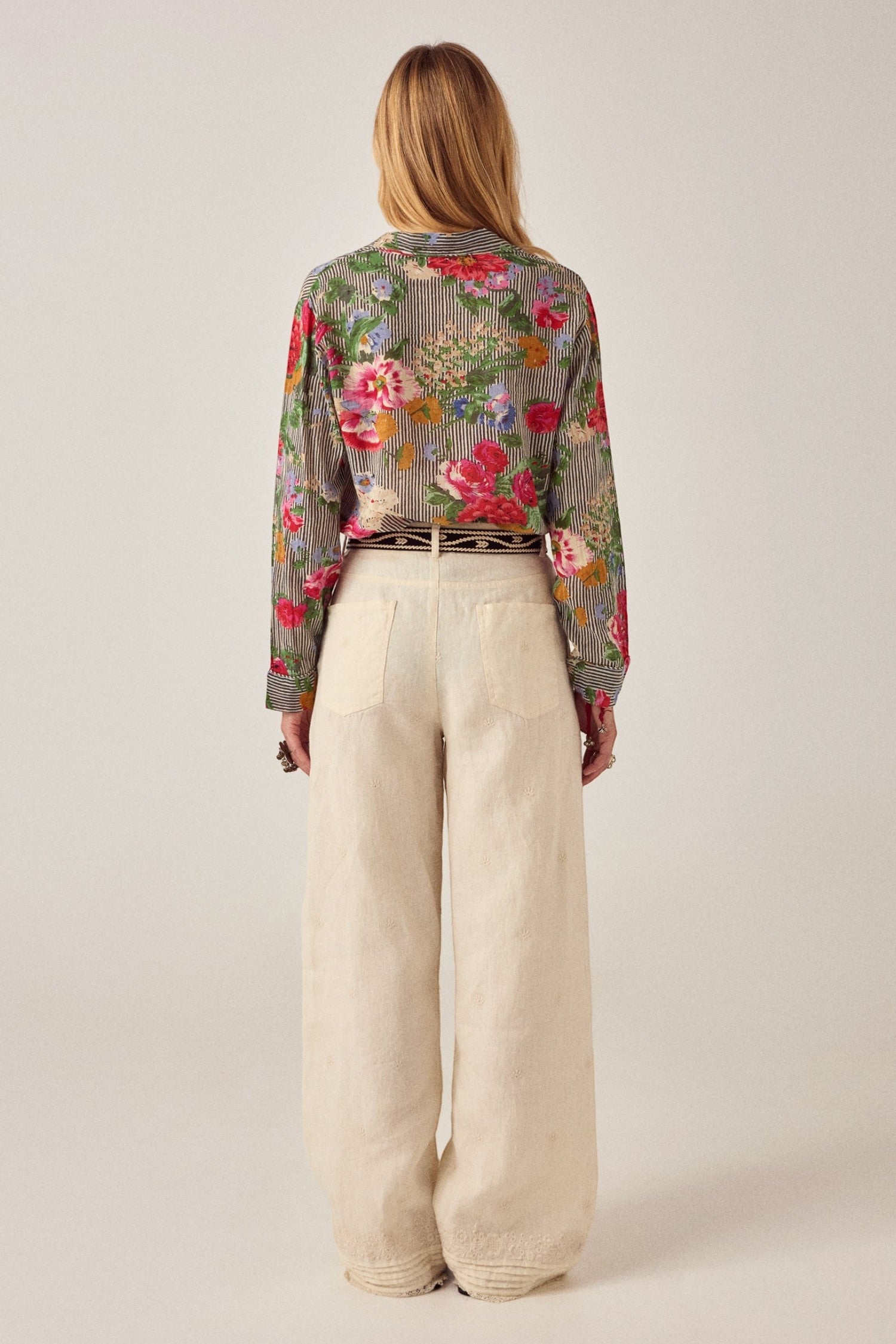 ELSHAM BOUTIQUE Otto Pant in ivory cotton-linen blend, featuring back pockets and embroidered hem, back view.