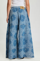 Back view of ELSHAM BOUTIQUE Daddios low waist super wide leg denim jeans in Aegean paisley blue cotton print