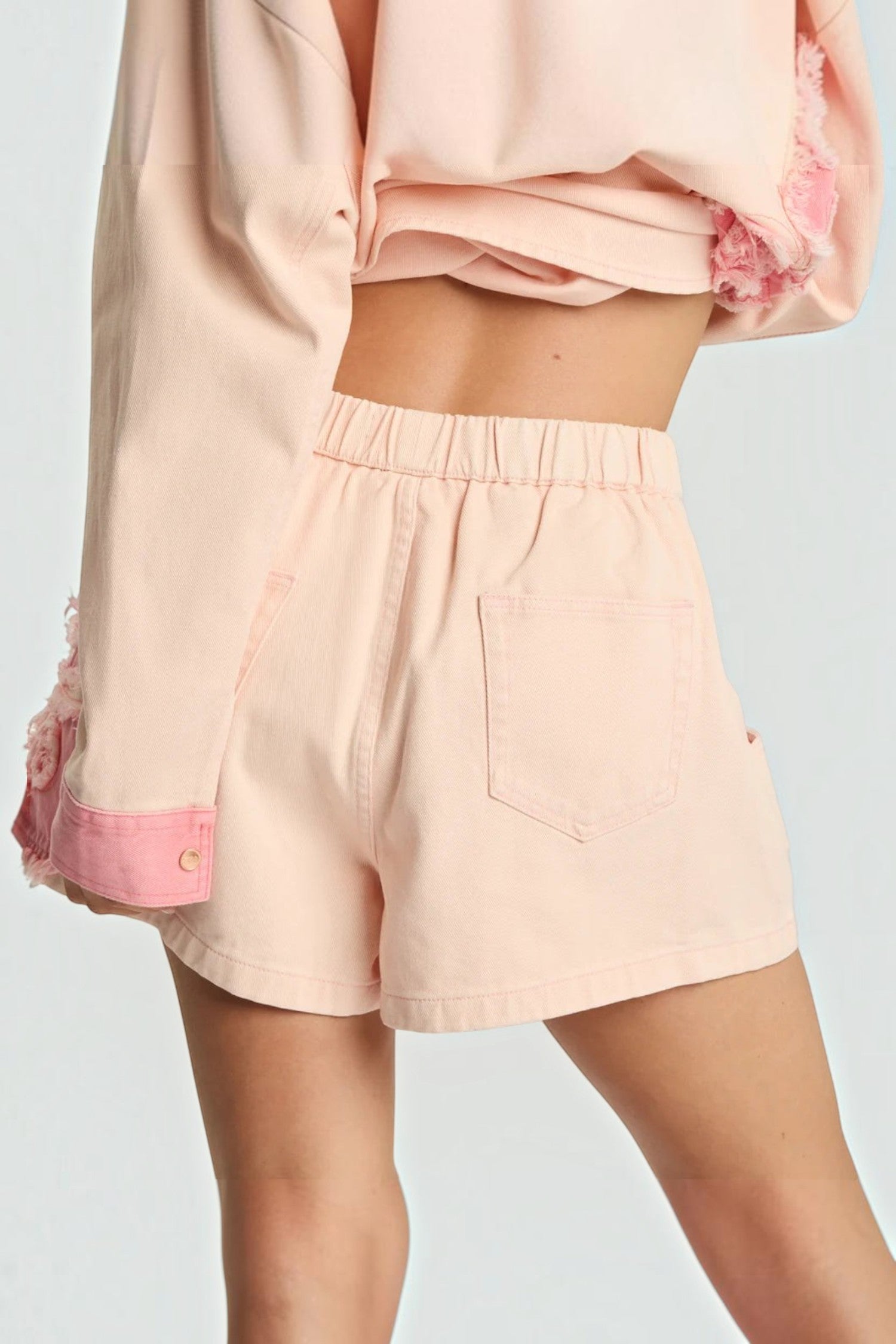 ELSHAM BOUTIQUE pink petal high waist elasticated denim shorts with a relaxed flippy fit and back pocket detail