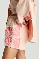 ELSHAM BOUTIQUE pink petal high waist flippy denim shorts with frayed embroidered butterfly detail and elastic waist