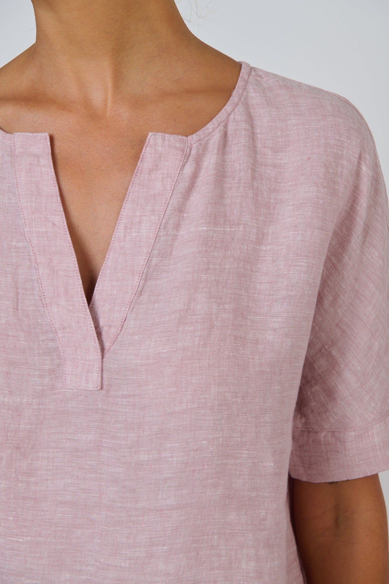 ELSHAM BOUTIQUE radish pink linen top with a split V-neckline and relaxed short sleeves