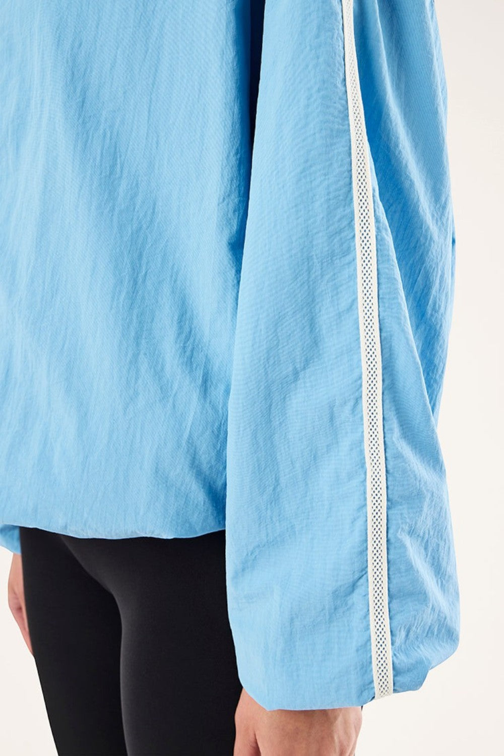 ELSHAM BOUTIQUE Alaskan Blue Radius Jacket featuring lightweight matte fabric and white side stripe sleeve detail