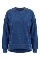 ELSHAM BOUTIQUE Remedy oversized indigo cotton crew neck sweatshirt with tonal Foxwood chest logo and side splits.