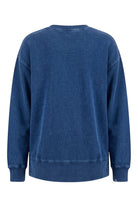ELSHAM BOUTIQUE Remedy oversized crew neck sweatshirt in indigo blue cotton with ribbed cuffs and side splits.