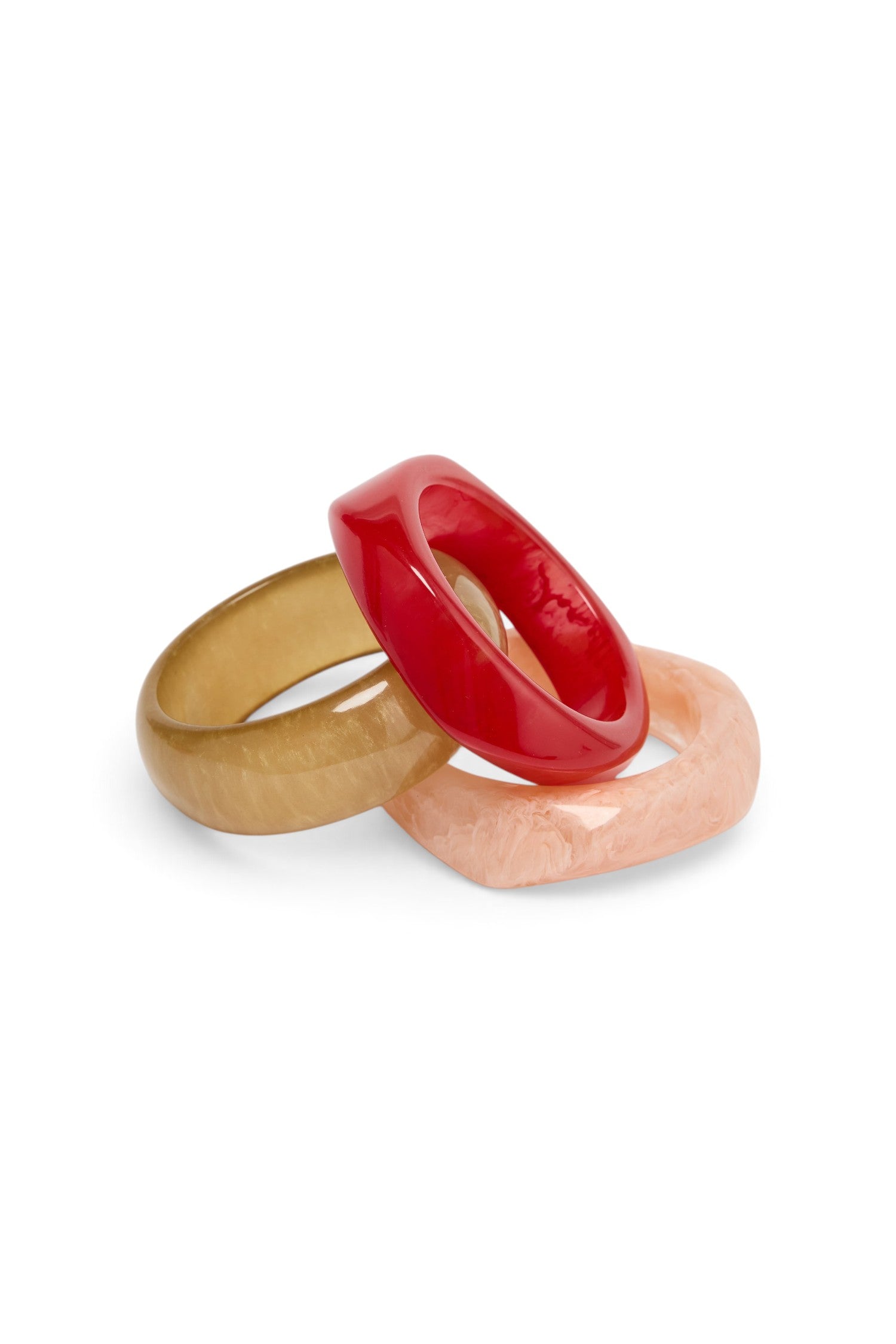 ELSHAM BOUTIQUE Morrissy bangle set featuring three stacked resin bracelets in red, beige, and marbled peach tones.