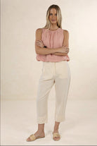 Model wearing ELSHAM BOUTIQUE Samara Top in musk pink linen-tencel with gathered neckline and elasticated hem