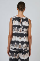 ELSHAM BOUTIQUE sleeveless poplin top in eruption tie-dye print featuring a curved high-low hem and back ribbon tie.